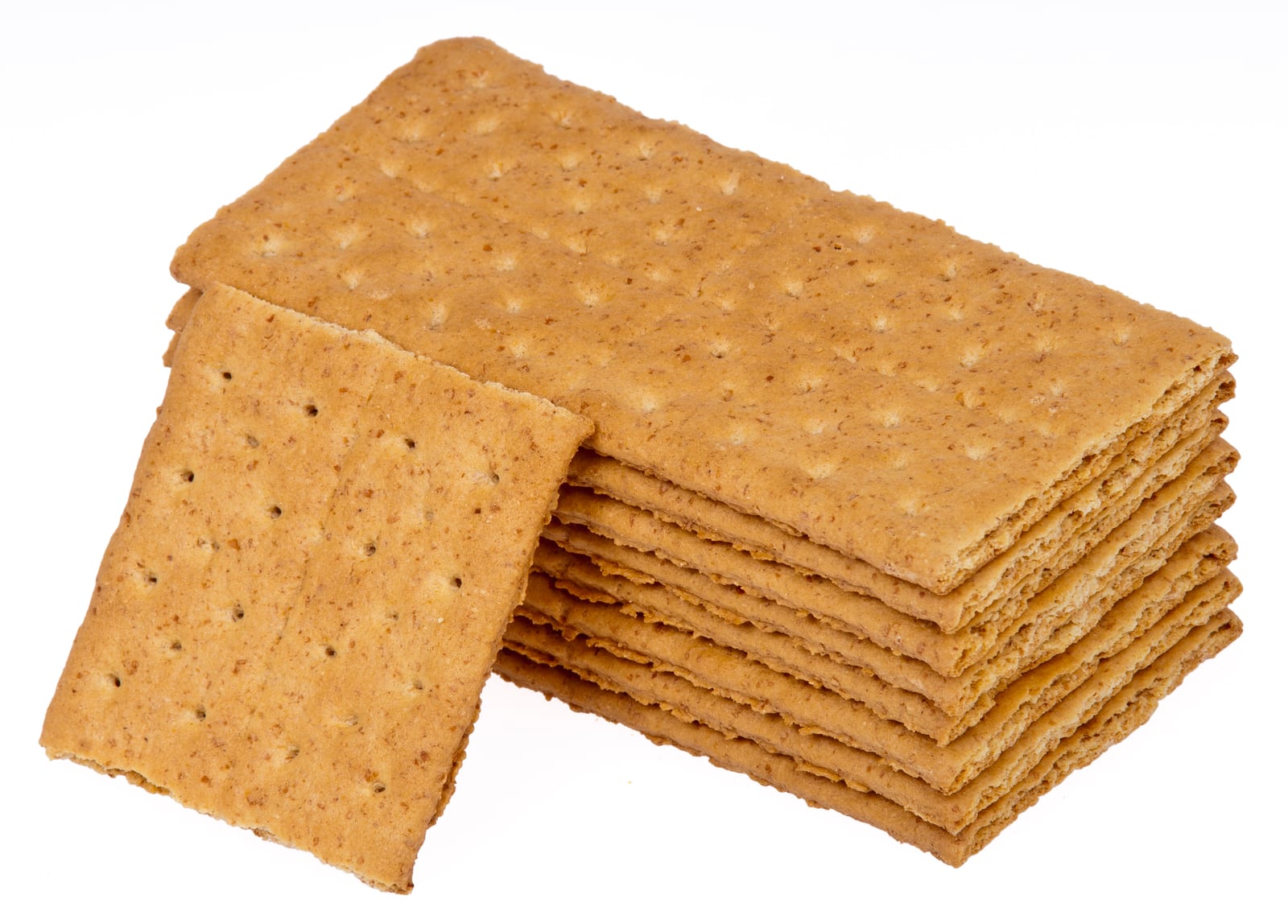 A neat stack of honey-brown graham cracker sheets against a white background.