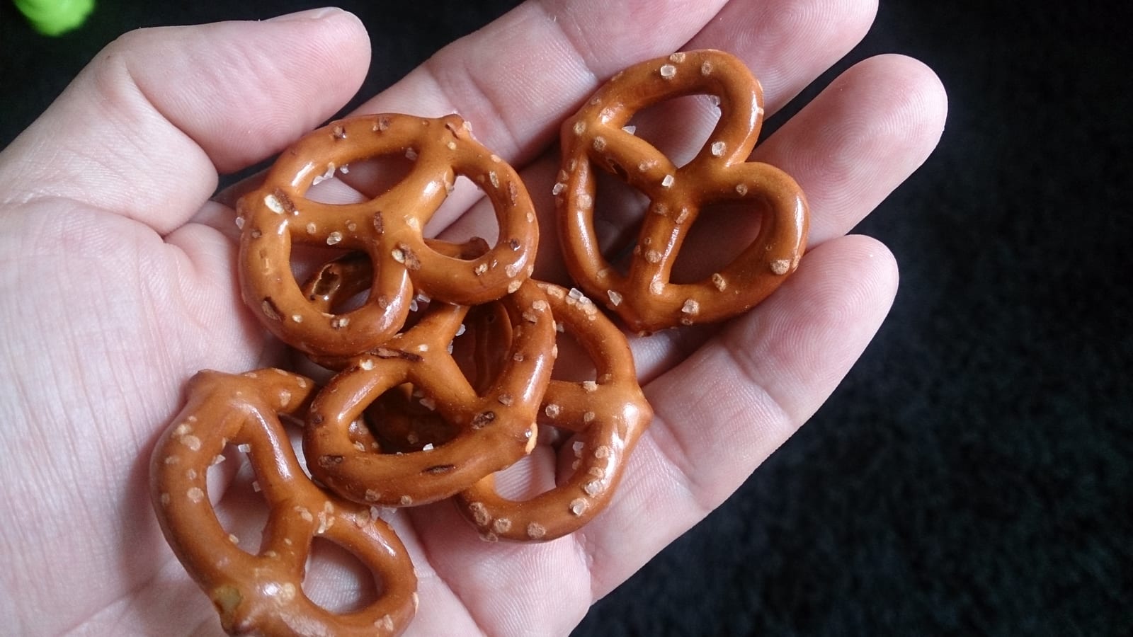 A handful of small salted pretzels.